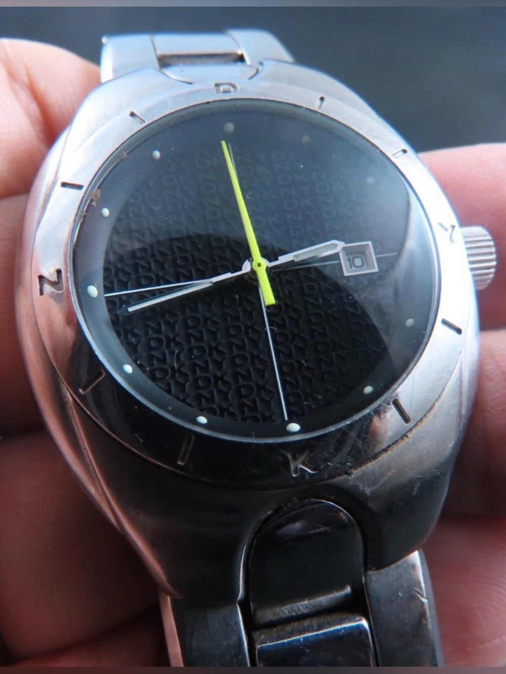 DKNY Silver Stainless Steel Watch with Black Dial and Yellow Second Hand